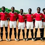 Home 14 모잠비크 축구 대표팀 역사 - "El Despertar de una Nación en el Campo de Juego" (The Awakening of a Nation on the Field of Play)**...